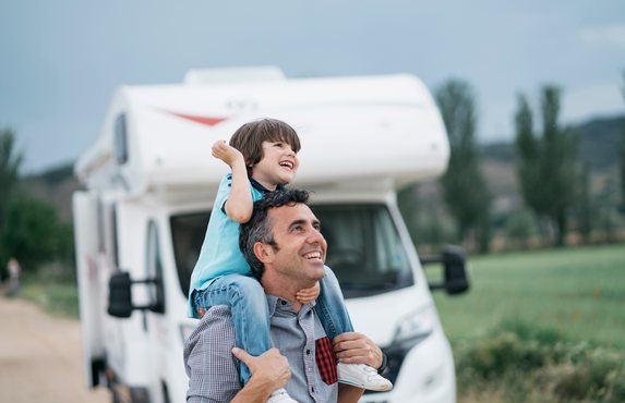 A family arriving for a break in their holiday caravan