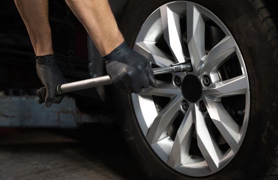 Changing a tyre in a garage workshop
