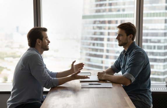 A candidate in an interview with a hiring manager