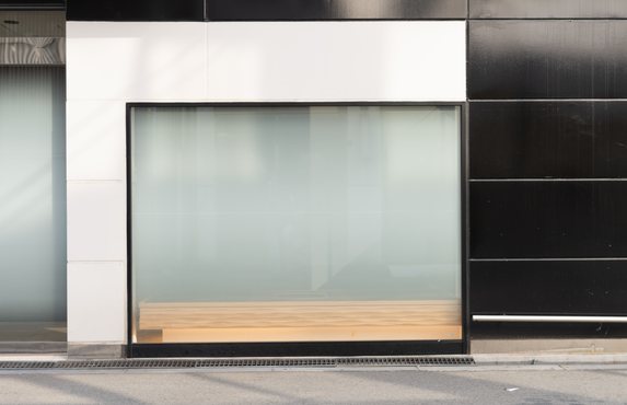A boutique shop front with a large display window