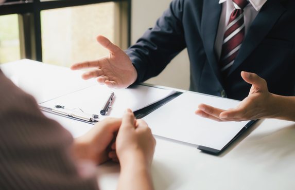 A solicitor giving advice to clients